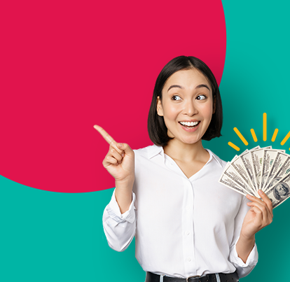 A woman with a cheerful expression, holding a fan of cash in one hand and pointing upwards with the other.