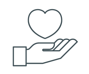 A hand holding up a heart.